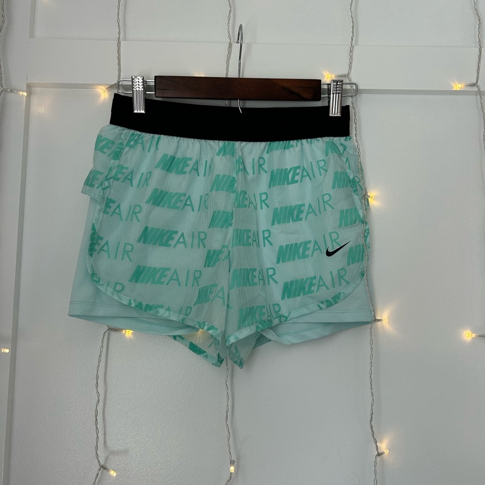 Green and light blue Nike shorts black waist band
